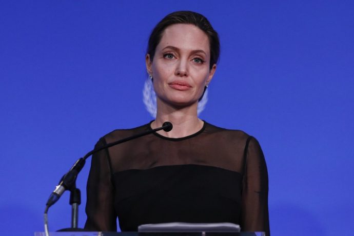 US actress and director and UN Special Envoy, Angelina Jolie, speaks at the UN Peacekeeping Defence Ministerial at Lancaster House in London on September 8, 2016. The meeting follows the Leaders Summit on Peacekeeping in September 2015. / AFP PHOTO / POOL / Adrian DENNIS