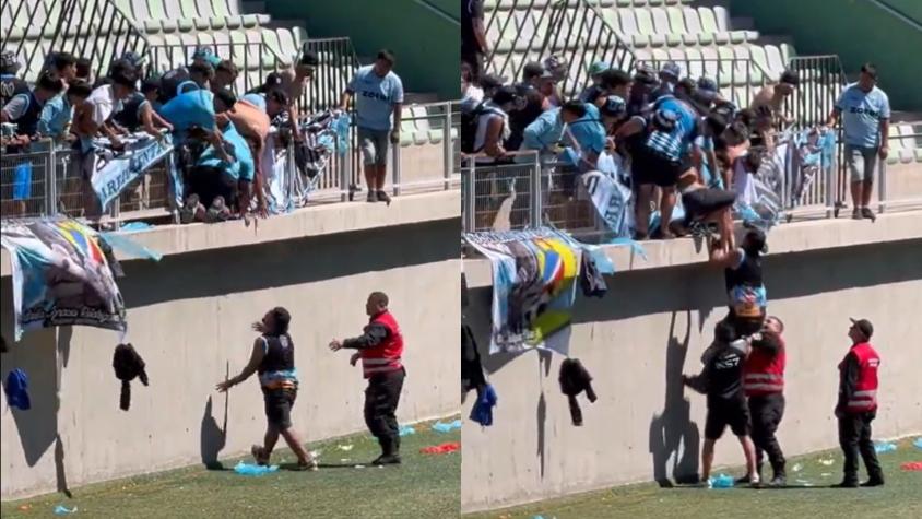 Video: Hinchas de Iquique protagonizaron desmanes y uno de ellos se lanzó de la tribuna
